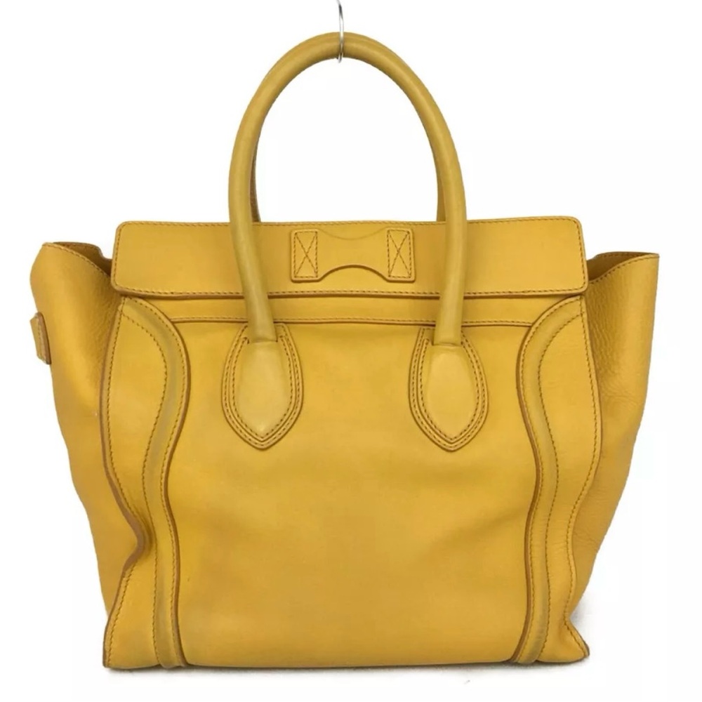 Authentic Micro Luggage Handbag In Drummed Calfskin comes with dustbag. - Picture 9 of 12